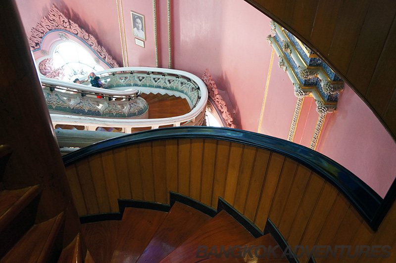 Wooden spiral staircase at Erawan Museum