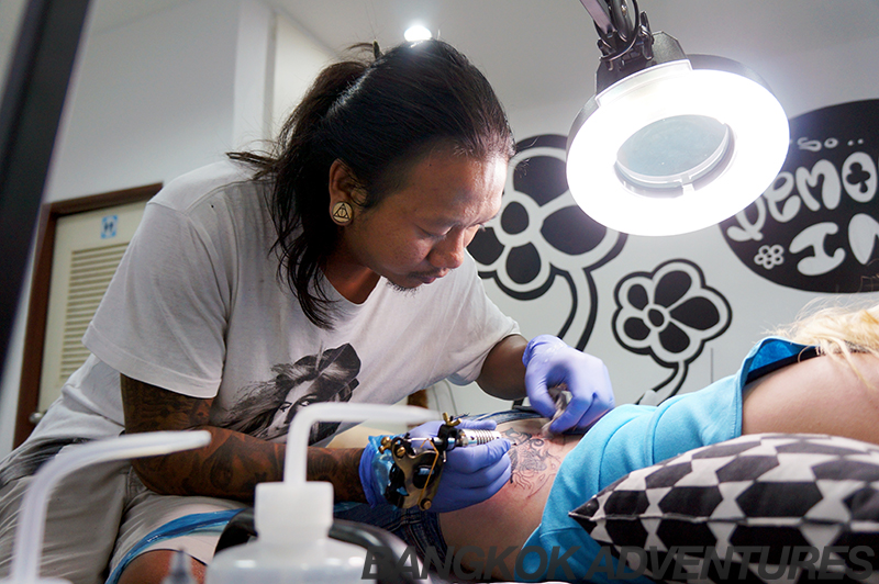 Tattoo artist Tong at Demonic Ink Bangkok tattoo studio